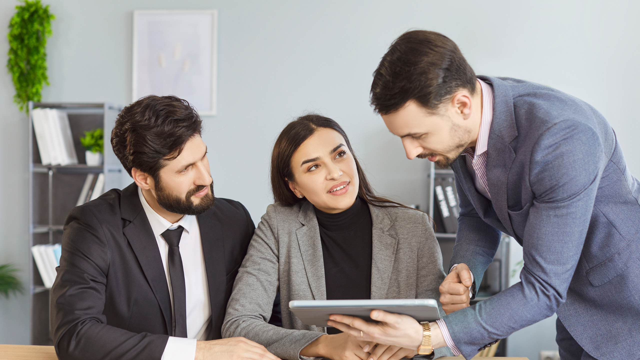 Mortgage team reviewing a client file together